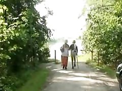 Horny granny sucking old penis in the forest